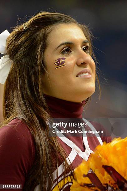 Central Michigan University Chippewas cheerleader looks on during the Little Caesars Pizza Bowl against the Western Kentucky University Hilltoppers...