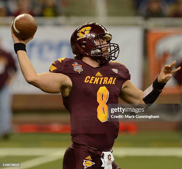 Ryan Radcliff of the Central Michigan University Chippewas throws a pass during the Little Caesars Pizza Bowl against the Western Kentucky University...