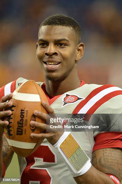 Kawaun Jakes of the Western Kentucky University Hilltoppers looks on prior to the start of the Little Caesars Pizza Bowl against the Central Michigan...