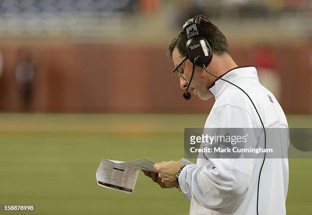 Head Coach Dan Enos of the Central Michigan University Chippewas looks on during the Little Caesars Pizza Bowl against the Western Kentucky...