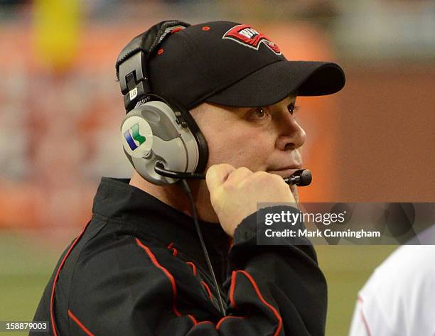 Western Kentucky University Hilltoppers interim head coach Lance Guidry looks on during the Little Caesars Pizza Bowl against the Central Michigan...