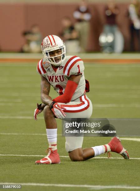 Jonathan Dowling of the Western Kentucky University Hilltoppers looks on in the first quarter of the Little Caesars Pizza Bowl against the Central...