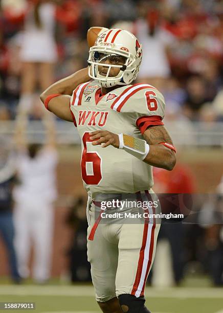 Kawaun Jakes of the Western Kentucky University Hilltoppers throws a pass during the Little Caesars Pizza Bowl against the Central Michigan...