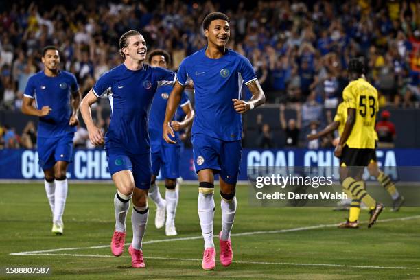 Mason Burstow of Chelsea celebrates after scoring their sides first goal during the pre-season friendly match between Chelsea FC and Borussia...