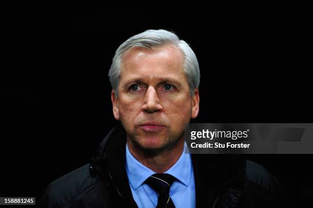 Newcastle manager Alan Pardew looks on before the Barclays Premier League match between Newcastle United and Everton at St James' Park on January 2,...