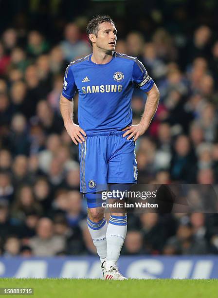 Frank Lampard of Chelsea looks on during the Barclays Premier League match between Chelsea and Queens Park Rangers at Stamford Bridge on January 2,...