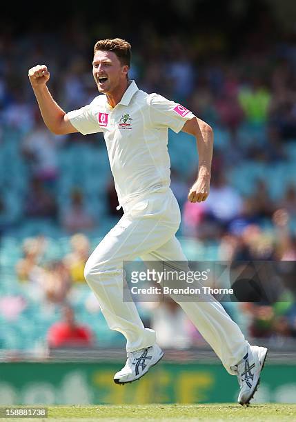 Jackson Bird of Australia celebrates after claiming the wicket of Dimuth Karunaratne of Sri Lanka during day one of the Third Test match between...