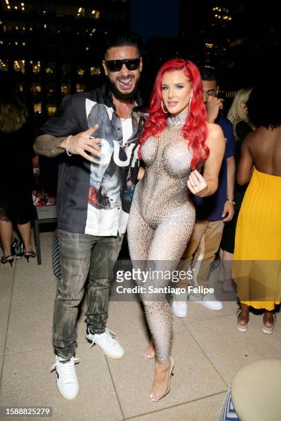 Paul "Pauly D" DelVecchio and Justina Valentine attend MTV's Jersey Shore Family Vacation NYC Premiere Party at Hard Rock Hotel New York on August...