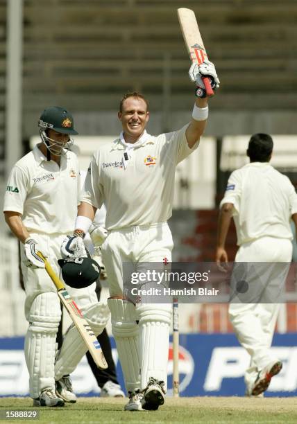 Matthew Hayden of Australia celebrates his century during day two of the Second Test match between Pakistan and Australia played at Sharjah...