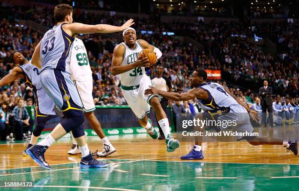 Paul Pierce of the Boston Celtics drives to the basket past Tony Allen of the Memphis Grizzlies during the game on January 2, 2013 at TD Garden in...