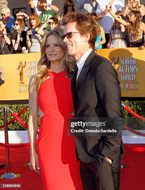 Actors Kyra Sedgwick and Kevin Bacon arrive at the 18th Annual Screen Actors Guild Awards held at The Shrine Auditorium on January 29, 2012 in Los...