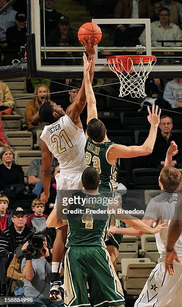Kyle Gaillard of William & Mary tries to block a shot by Sheldon Jeter of the Vanderbilt Commodores at Memorial Gym on January 2, 2013 in Nashville,...