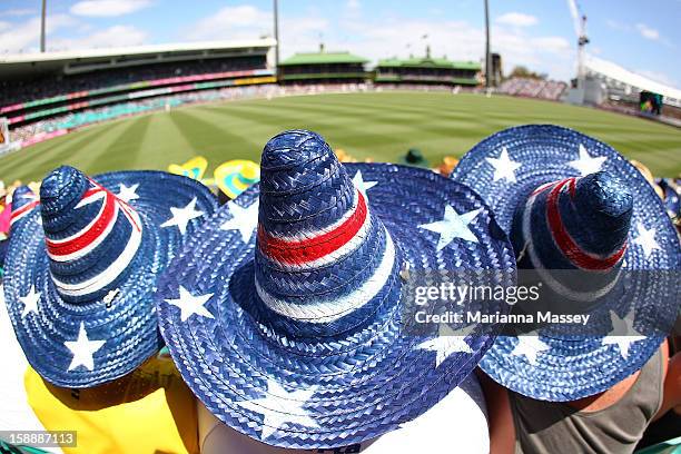 Fans wear Australian flag sombreros in the crowd during day one of the Third Test match between Australia and Sri Lanka at Sydney Cricket Ground on...