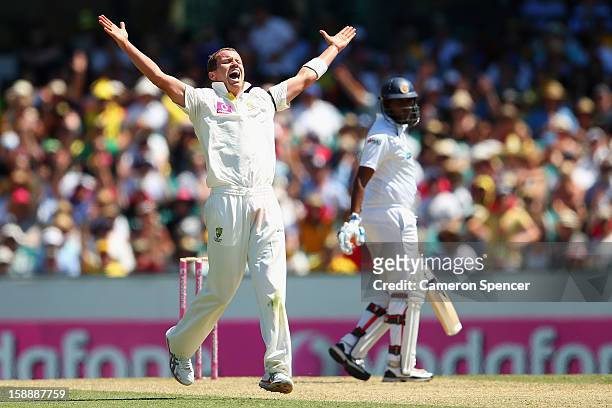 Peter Siddle of Australia celebrates dismissing Thilan Samaraweera of Sri Lanka for lbw during day one of the Third Test match between Australia and...