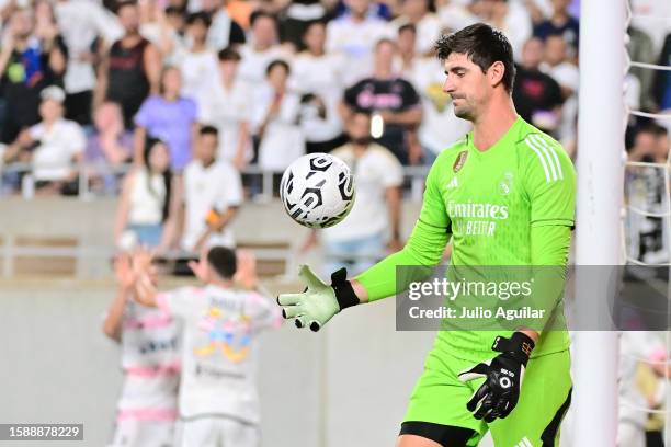 Thibaut Courtois of Real Madrid reacts after giving up a goal to Dušan Vlahović of Juventus in stoppage time during the pre-season friendly match at...