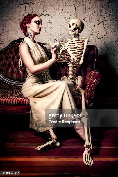 woman and skeleton - funny skeleton stock pictures, royalty-free photos & images