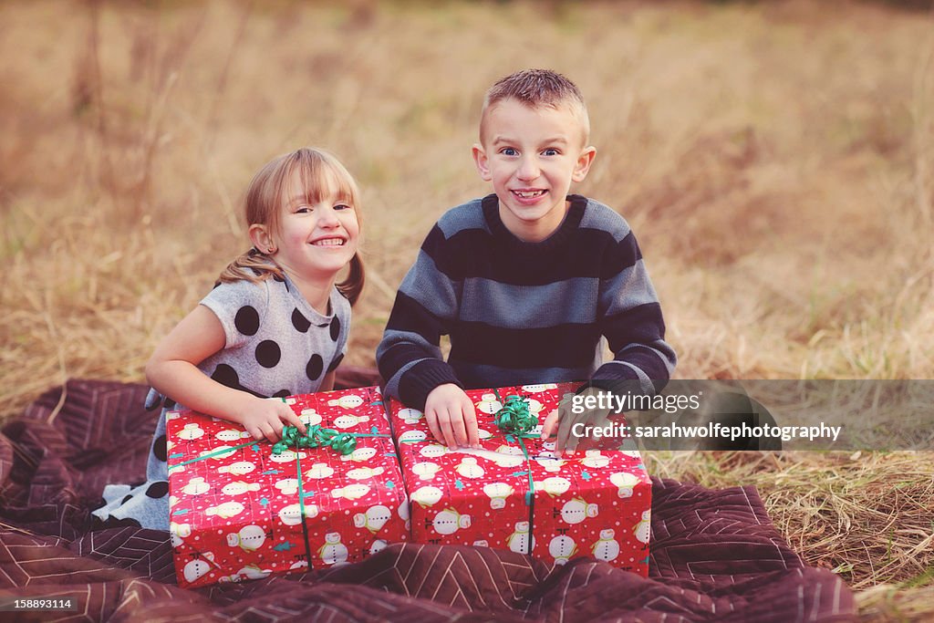 Two children with presents