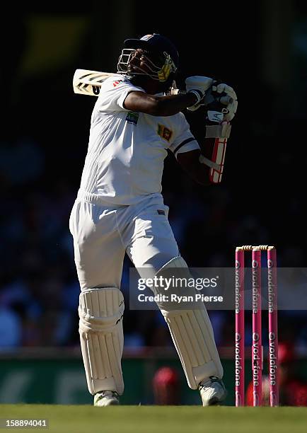 Suranga Lakmal of Sri Lanka bats during day one of the Third Test match between Australia and Sri Lanka at Sydney Cricket Ground on January 3, 2013...