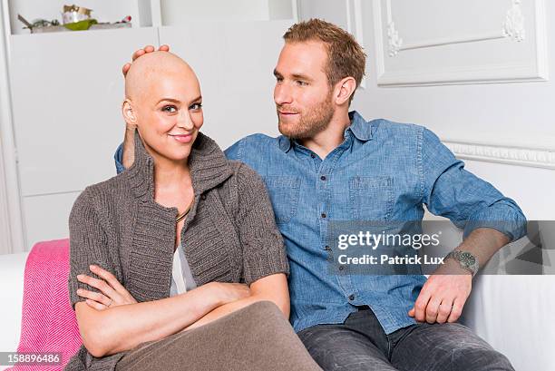 German actress Verena Mundhenke being bald after having a chemotherapy and her partner Florian Kringe of German Bundesliga team Borussia Dortmund...