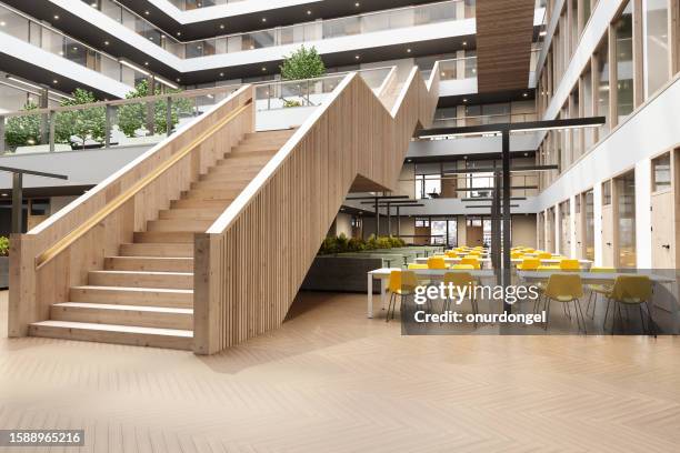 modern office or library interior with wooden staircase, plants and waiting area - byggnadsdetalj bildbanksfoton och bilder
