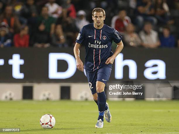 Mathieu Bodmer of PSG in action during the friendly match between Paris Saint-Germain FC and Lekhwiya Sports Club at the Al-Sadd Sports Club stadium...