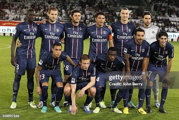 The PSG team line up ahead of the friendly match between Paris Saint-Germain FC and Lekhwiya Sports Club at the Al-Sadd Sports Club stadium on...