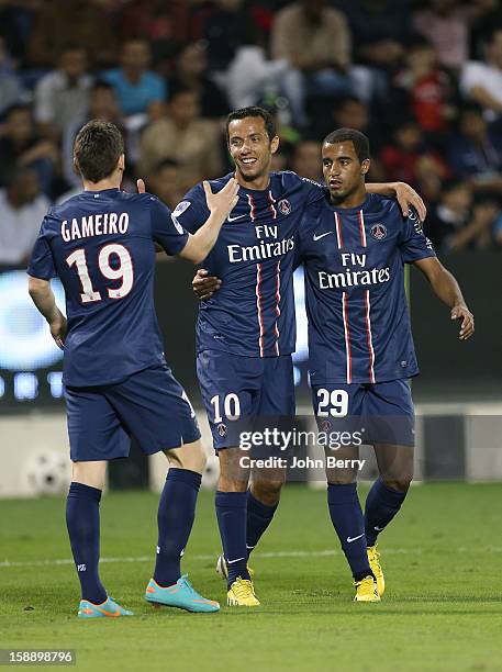 Kevin Gameiro, Nene and Lucas Moura of PSG celebrate a goal during the friendly match between Paris Saint-Germain FC and Lekhwiya Sports Club at the...