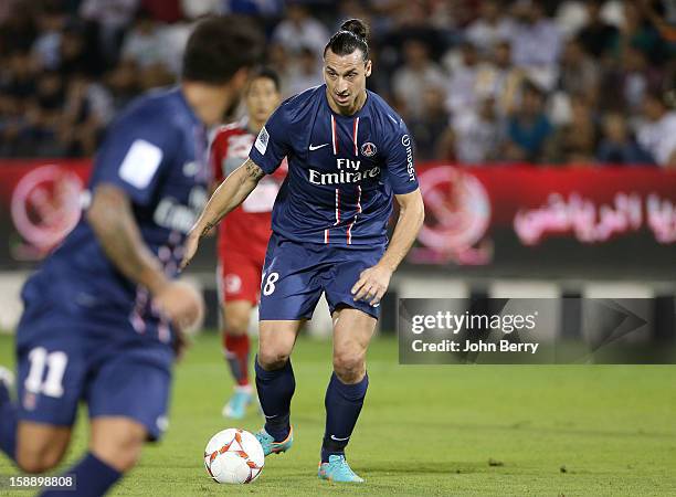 Zlatan Ibrahimovic of PSG in action during the friendly match between Paris Saint-Germain FC and Lekhwiya Sports Club at the Al-Sadd Sports Club...