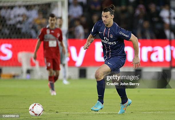 Zlatan Ibrahimovic of PSG in action during the friendly match between Paris Saint-Germain FC and Lekhwiya Sports Club at the Al-Sadd Sports Club...