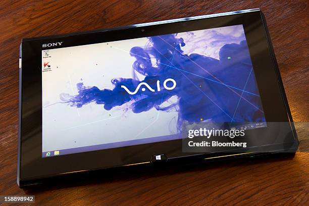 The Sony Corp. Duo 11 Ultrabook is arranged for a photograph in San Francisco, California, U.S., on Thursday, Dec. 27, 2012. Sony's Duo 11 Ultrabook...