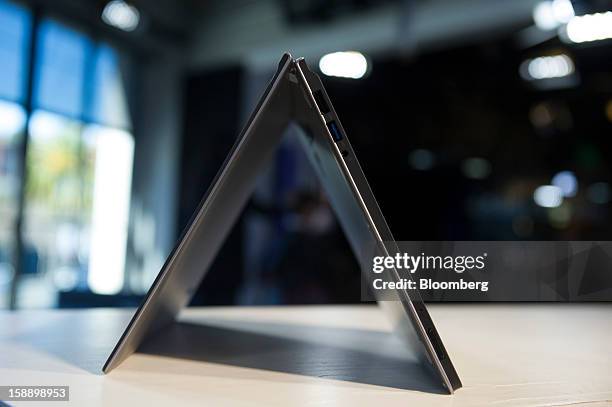 The Lenovo Group Ltd. IdeaPad Yoga is arranged for a photograph in San Francisco, California, U.S., on Thursday, Dec. 27, 2012. Lenovo’s IdeaPad Yoga...