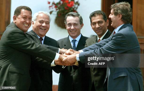 The Presidents Hugo Chavez of Venezuela, Gonzalo Sanchez de Losada of Bolivia, Alvaro Uribe of Colombia, Lucio Gutierrez of Ecuador and Peru's vice...