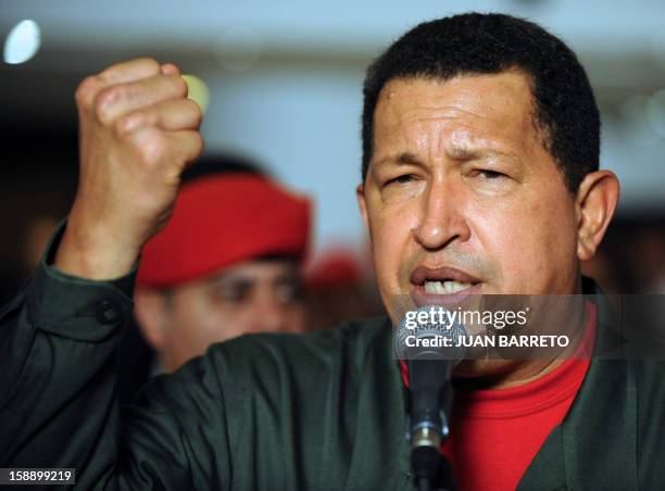 Venezuelan President Hugo Chavez, raises his fist as he speaks in Porlamar, capital of Margarita Island, Venezuela, on September 25, 2009. The 2nd...