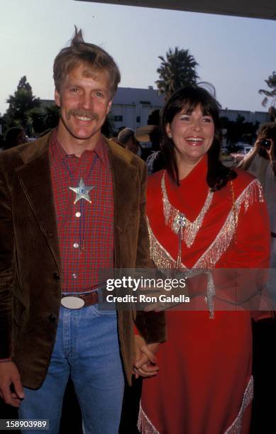 Actor Jameson Parker and wife Bonnie Parker attend 34th Annual SHARE Boomtown Party on May 16, 1987 at the Santa Monica Civic Auditorium in Santa...