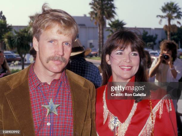 Actor Jameson Parker and wife Bonnie Parker attend 34th Annual SHARE Boomtown Party on May 16, 1987 at the Santa Monica Civic Auditorium in Santa...