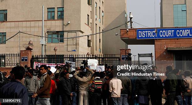 Activists of Pragatishil Mahila Sangathan Delhi and women lawyers protesting outside newly inaugurated fast track court at Saket District court where...