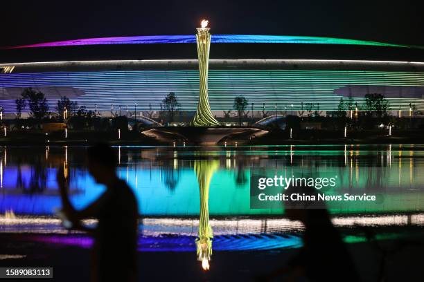 The torch tower of the 31st FISU Summer World University Games is ignited at Chengdu Dong'an Lake Sports Park at night on August 2, 2023 in Chengdu,...