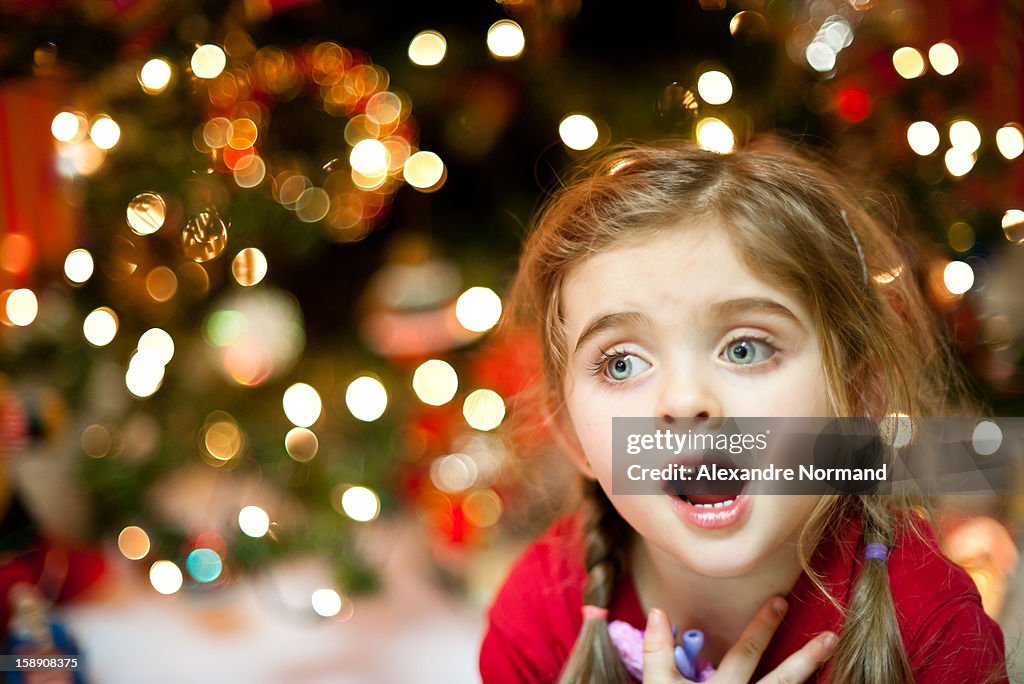 Young girl singing Christmas Carol