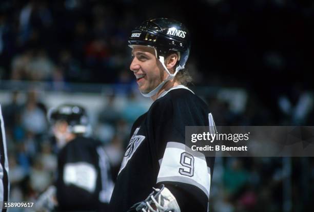 Bernie Nicholls of the Los Angeles Kings stands on the ice during an NHL game against the New York Islanders on January 19, 1989 at the Nassau...
