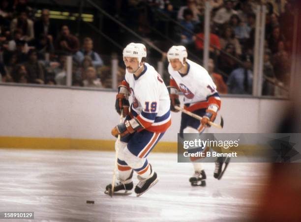 Bryan Trottier of the New York Islanders skates with the puck during an NHL game against the Atlanta Flames on March 3, 1979 at the Nassau Coliseum...