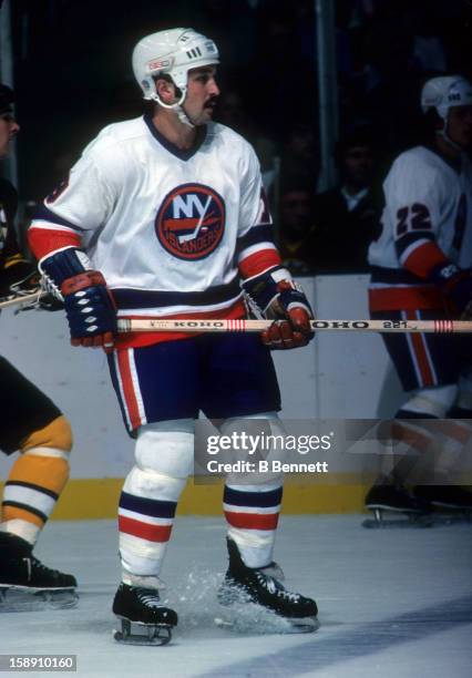 Bryan Trottier of the New York Islanders skates on the ice during an NHL game against the Boston Bruins on October 15, 1977 at the Nassau Coliseum in...