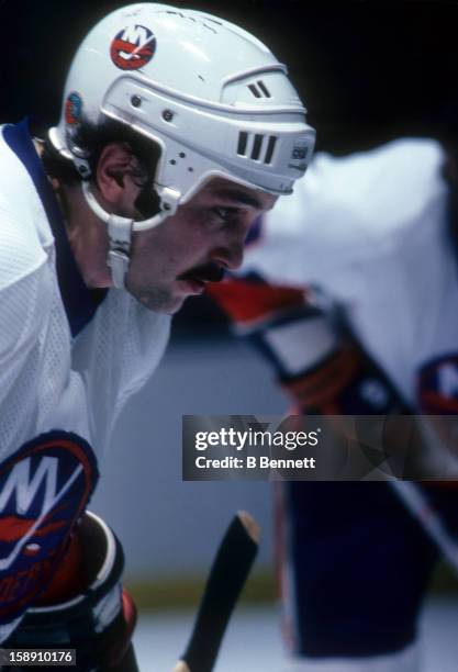 Bryan Trottier of the New York Islanders takes the face-off during an NHL game in January, 1979 at the Nassau Coliseum in Uniondale, New York.