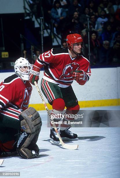 Patrik Sundstrom of the New Jersey Devils skates in front of his goalie Alain Chevrier during an NHL game against the New York Islanders on January...