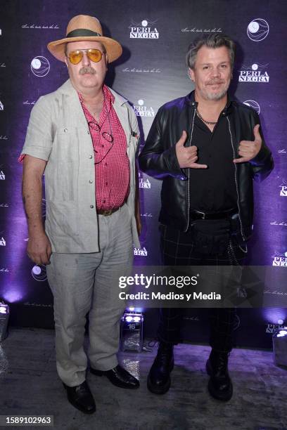 Adrián Herrera and Poncho Cadena pose for a photo during the red carpet in opening of 'La Perla Negra' Restaurant at Colonia Condesa on August 2,...