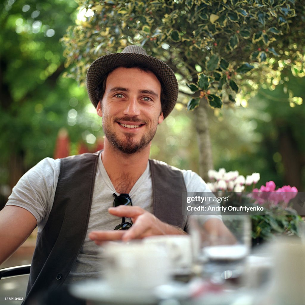 Smiling man in a hat