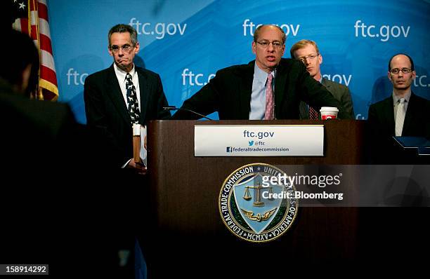 Jon Leibowitz, chairman of the Federal Trade Commission , center, speaks during a news conference with Richard "Rich" Feinstein, director of...