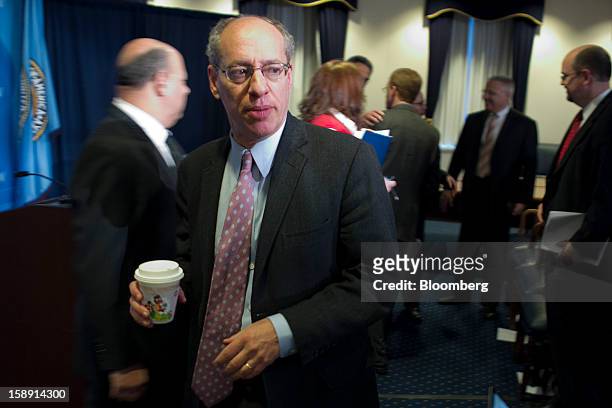 Jon Leibowitz, chairman of the Federal Trade Commission , walks out after a news conference in Washington, D.C., U.S., on Thursday, Jan. 3, 2013....