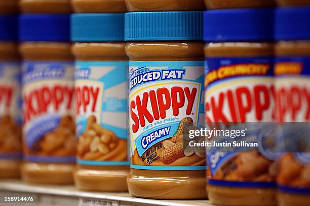 Jars of Skippy peanut butter are displayed on a shelf at Cal Mart grocery store on January 3, 2013 in San Francisco, California. Hormel, the maker of...