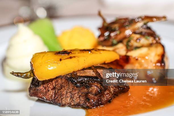 Close-up view of the smoked flat iron beef with grilled sweet pickled pepper entree prepared by executive chef Suki Sugiura for the 2013 Golden Globe...