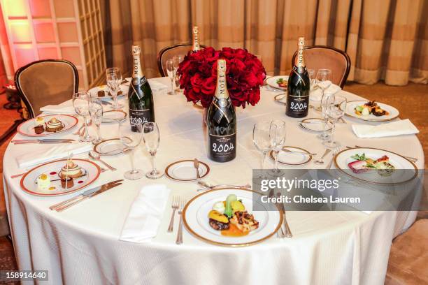 An overall view of table setting with the appetizer, entree and dessert prepared by executive chef Suki Sugiura and executive pastry chef Thomas...